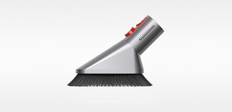 Quick-release mini soft dusting brush.